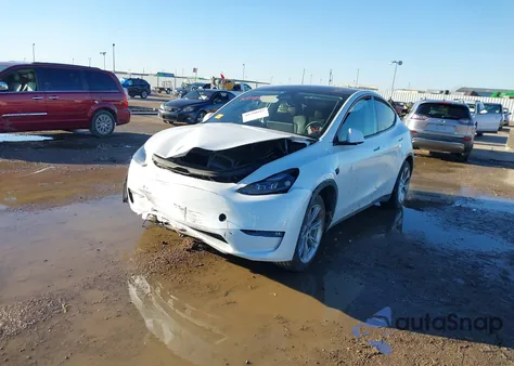 2023 Tesla Model Y Rwd from USA, damaged, VIN 7SAYGDED9PF942211